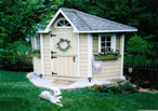 Storage sheds don't have to be huge to get everything put away.