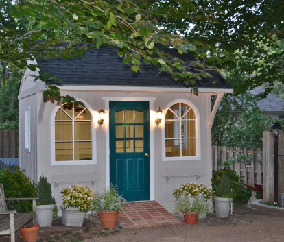 Glen Echo ivory shed 8 x 12 with antique flower boxes and arched door in Overland Park, Kansas. ID number 169673.