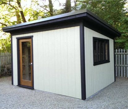 Front right view of a 10' x 12' Urban Studio with white siding and black trim