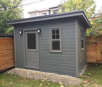 Front right view of a 8' x 12' Urban Studio fully painted grey 