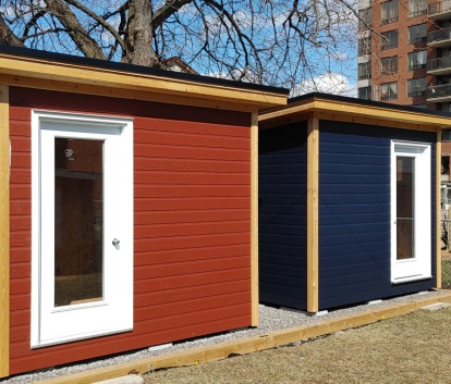 Front left view of two matching 8' x 10' Urban Studio sheds