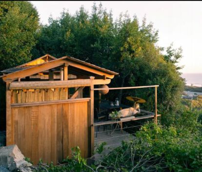 Front view of 10’x16' Bali Tea House Spa Enclosure located in Stinson Beach, California – Summerwood Products