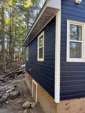 Back wall view of 16’ x 24’ Breckenridge cabin located in Algonquin Highlands, Ontario – Summe