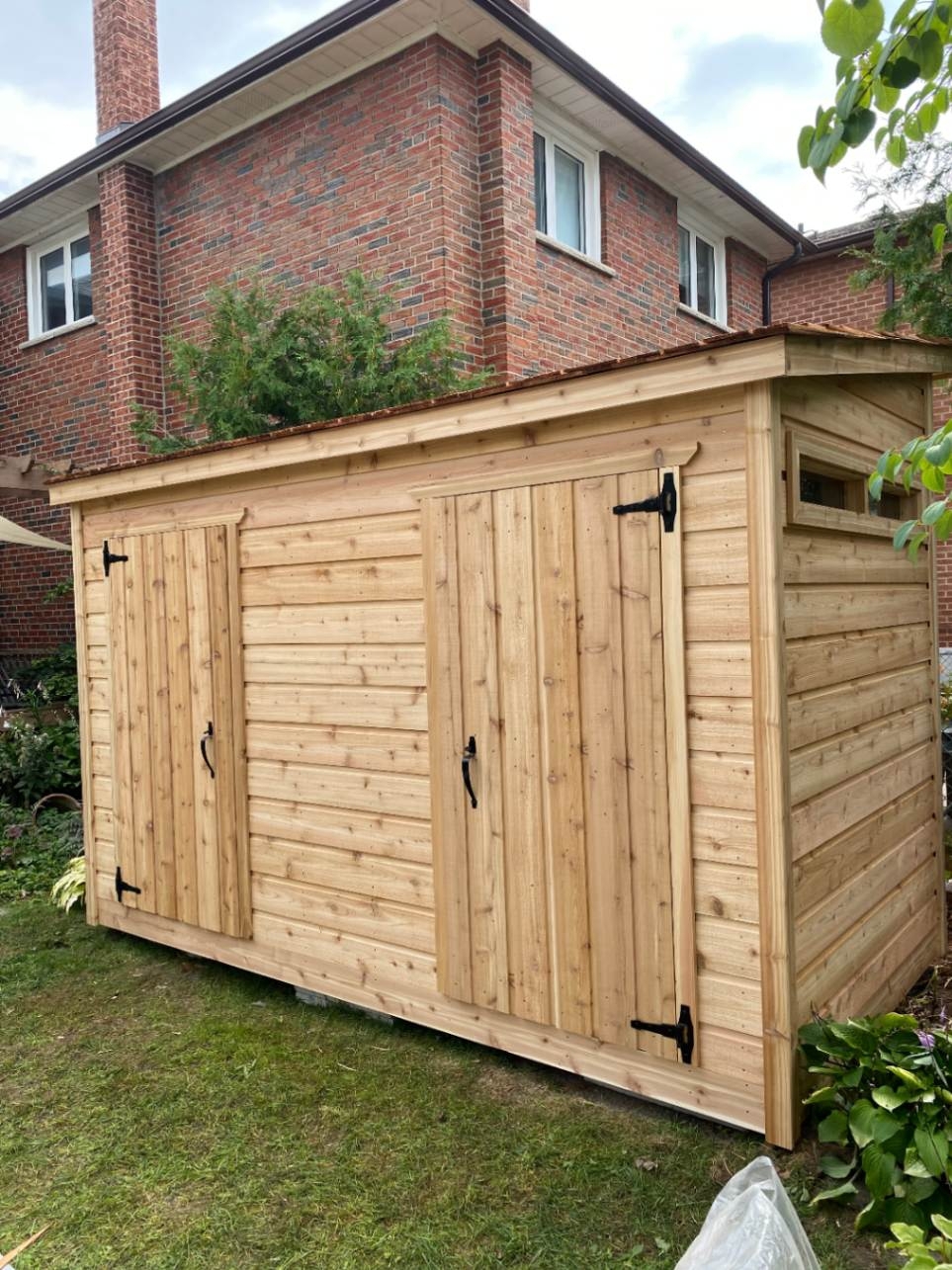 Front view of 6’ x 12' Sarawak Garden Shed located in Toronto, Ontario – Summerwood Products