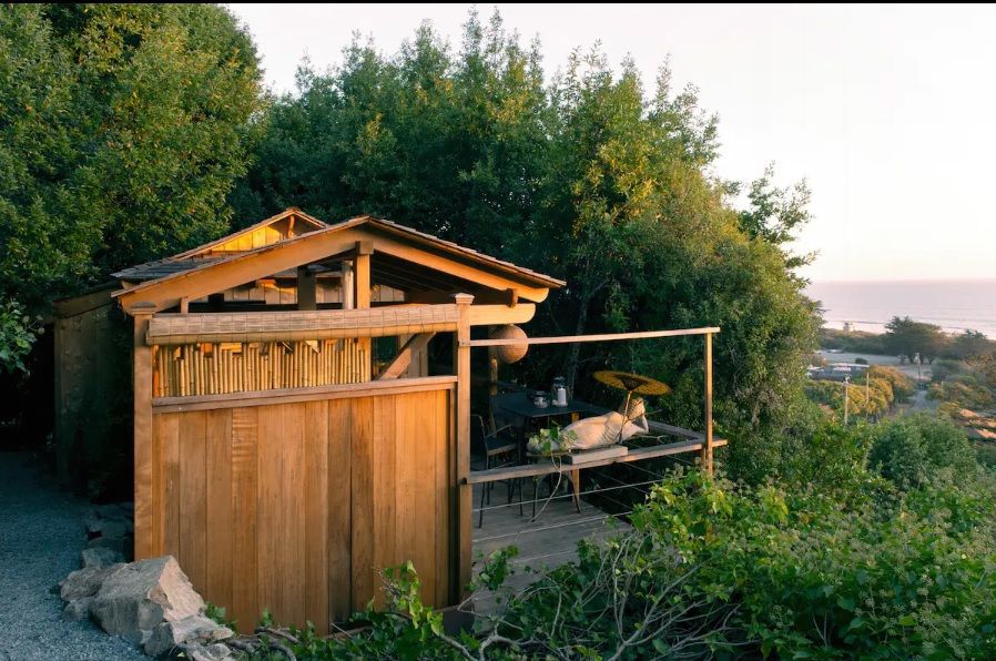 Front view of 10' x 16' Bali Tea House Spa Enclosure located in Stinson Beach, California – Summer