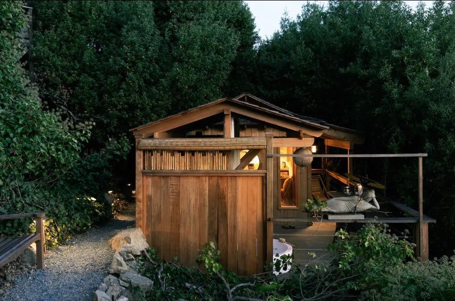 Front view of 10' x 16' Bali Tea House Spa Enclosure located in Stinson Beach, California – Summer