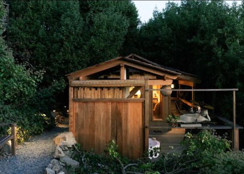Front view of 10' x 16' Bali Tea House Spa Enclosure located in Stinson Beach, California – Summer