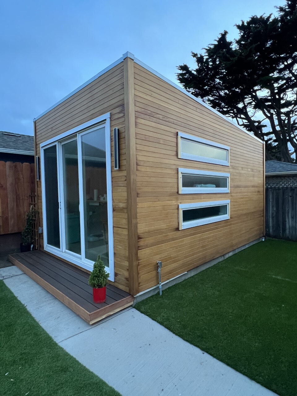 Side view of 18’ x 12' Quadra Home Studio located in Pacifica, California – Summerwood Products