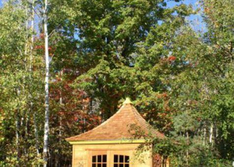Cedar Melbourne Shed 10 x 10 with double arched doors in Traverse City, Missouri. ID number 42626-7