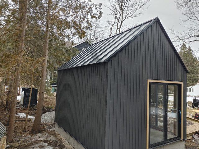 Front view of 12’ x 14' Mini Oban Cabin located in Caledon, Ontario – Summerwood Products