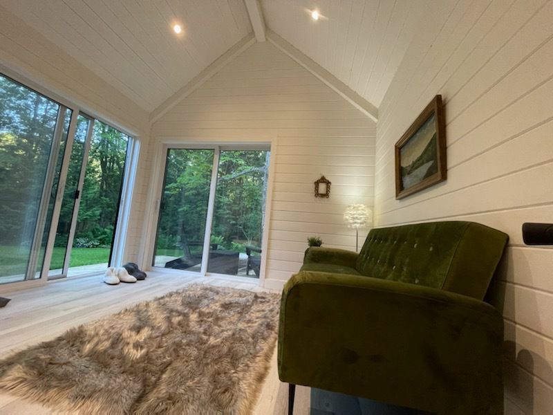 Interior view of 12’ x 14' Mini Oban Cabin located in Caledon, Ontario – Summerwood Products