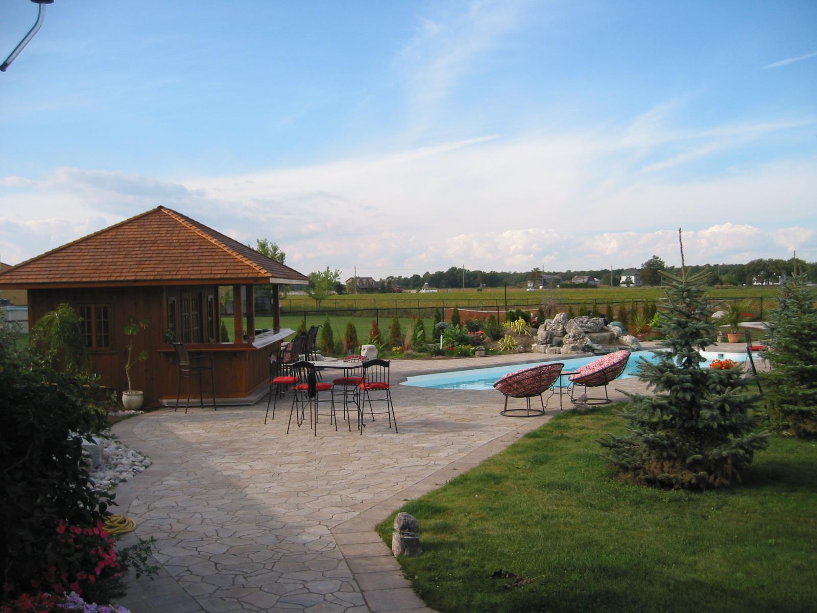 Cedar barside pool cabana 13x16 with double casement windows in Grimsby Ontario. ID number 100816-2.