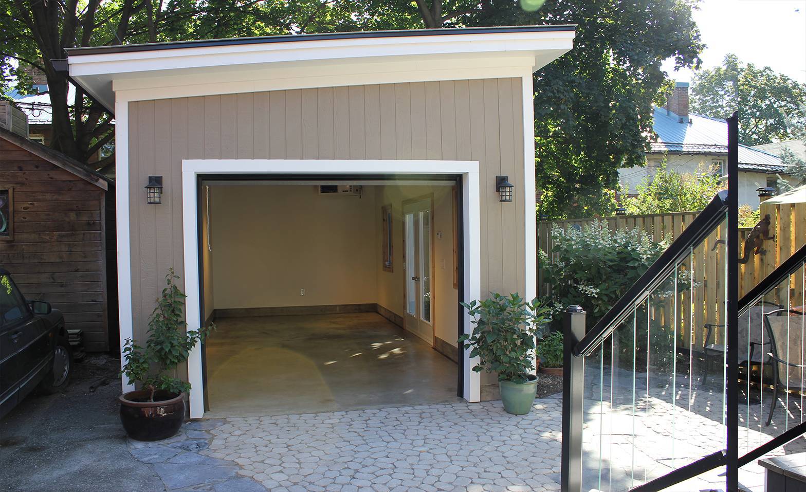 Front view of 12' x 24' Canexel Urban Garage located in Scarborough, Ontario – Summerwood Products