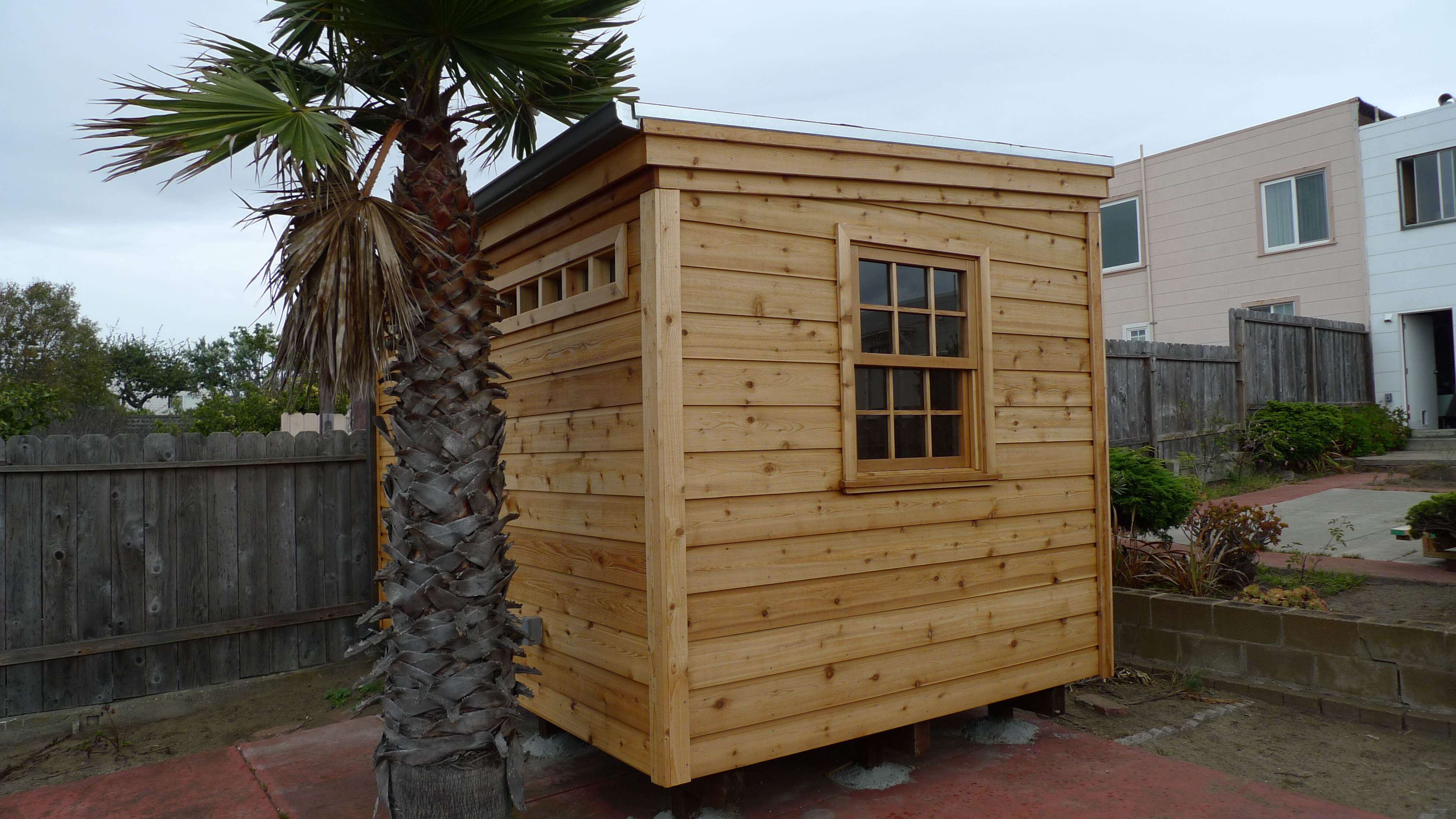 Urban studio garden shed 8x12 with Solid deluxe single door in San Francisco California. ID number 1