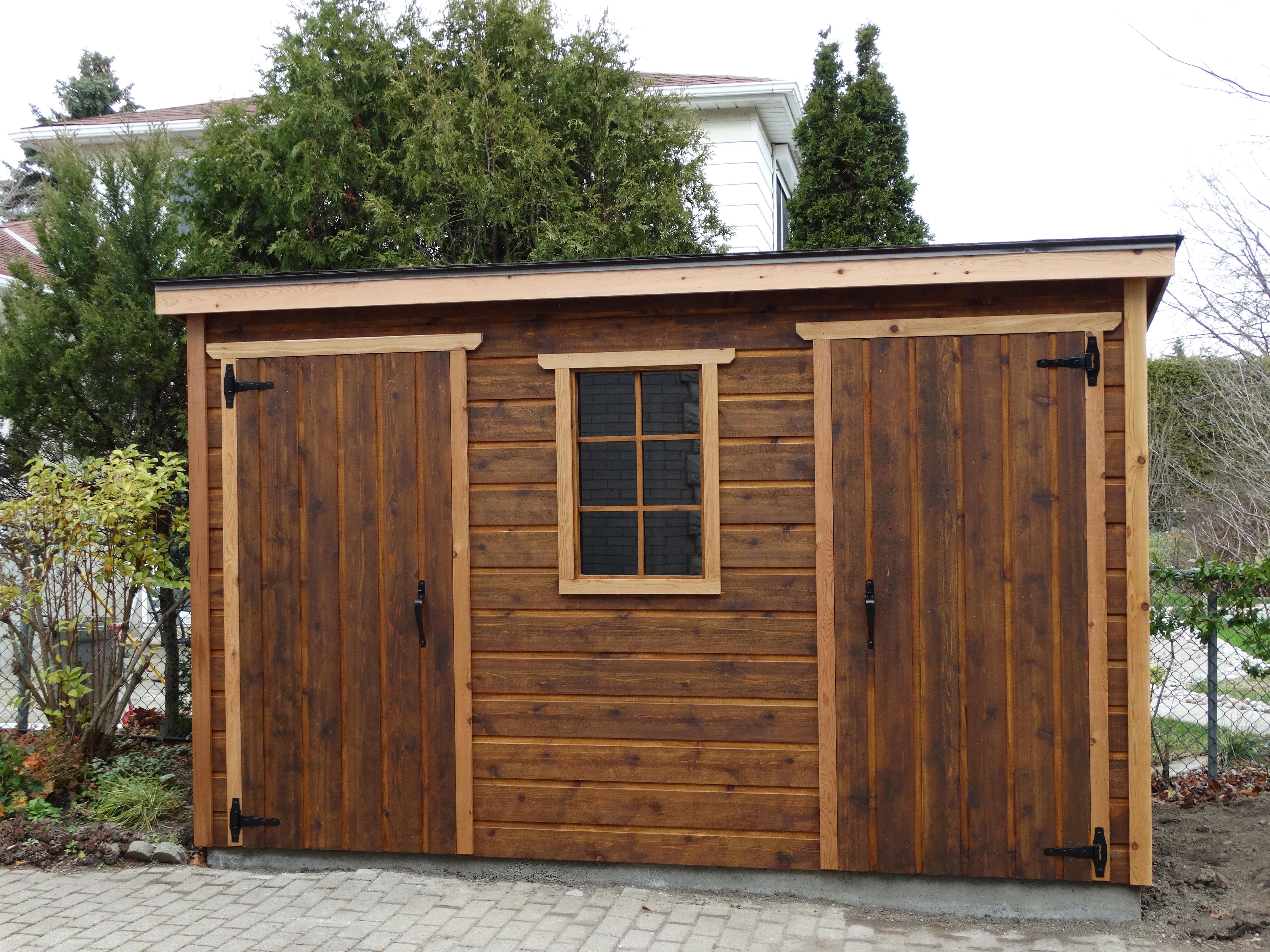 Cedar Sarawak lean to shed 5x12 with fixed window in Toronto, Ontario. ID number 195929-2