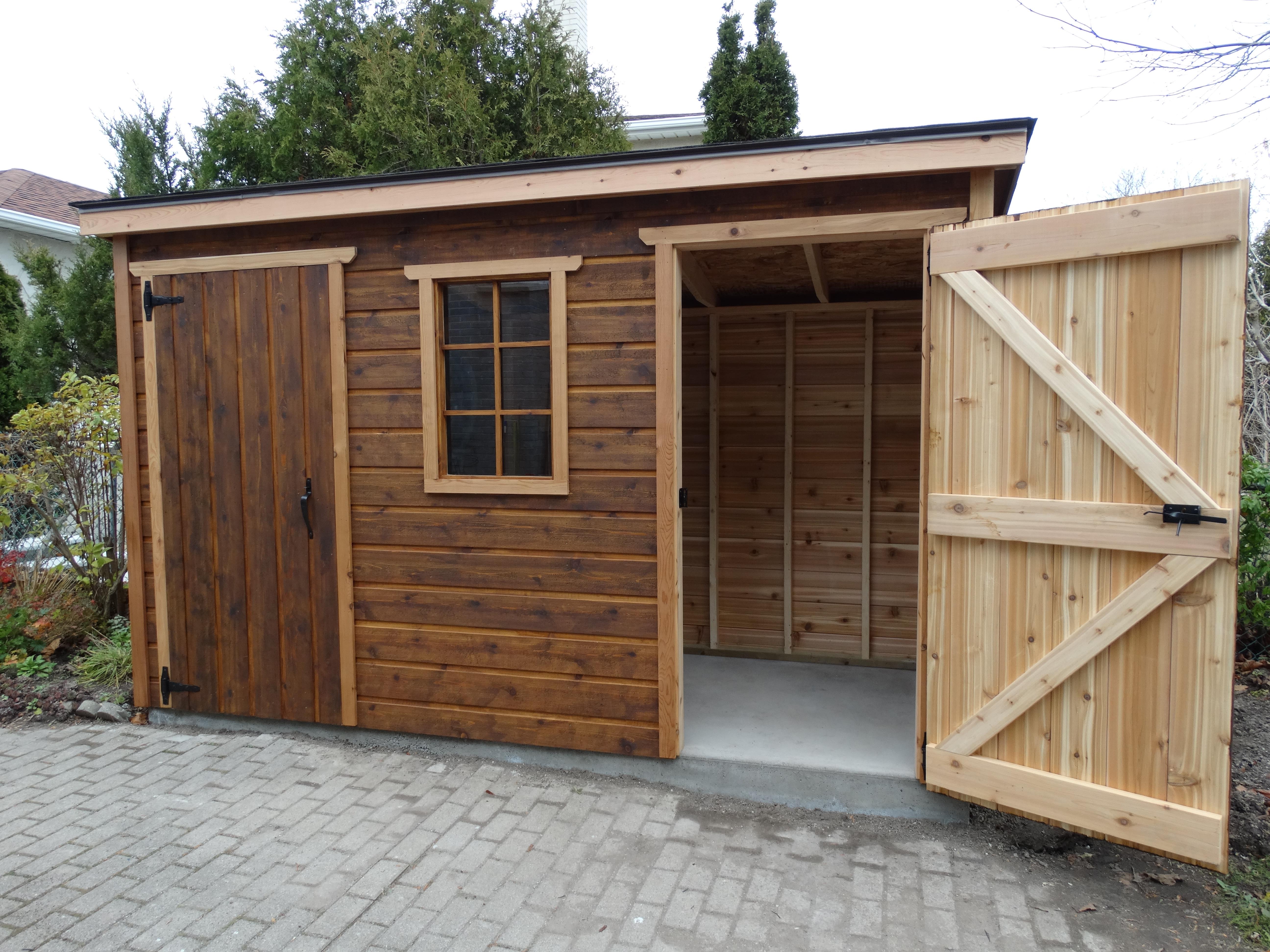 Cedar Sarawak lean to shed 5x12 with fixed window in Toronto, Ontario. ID number 195929-3