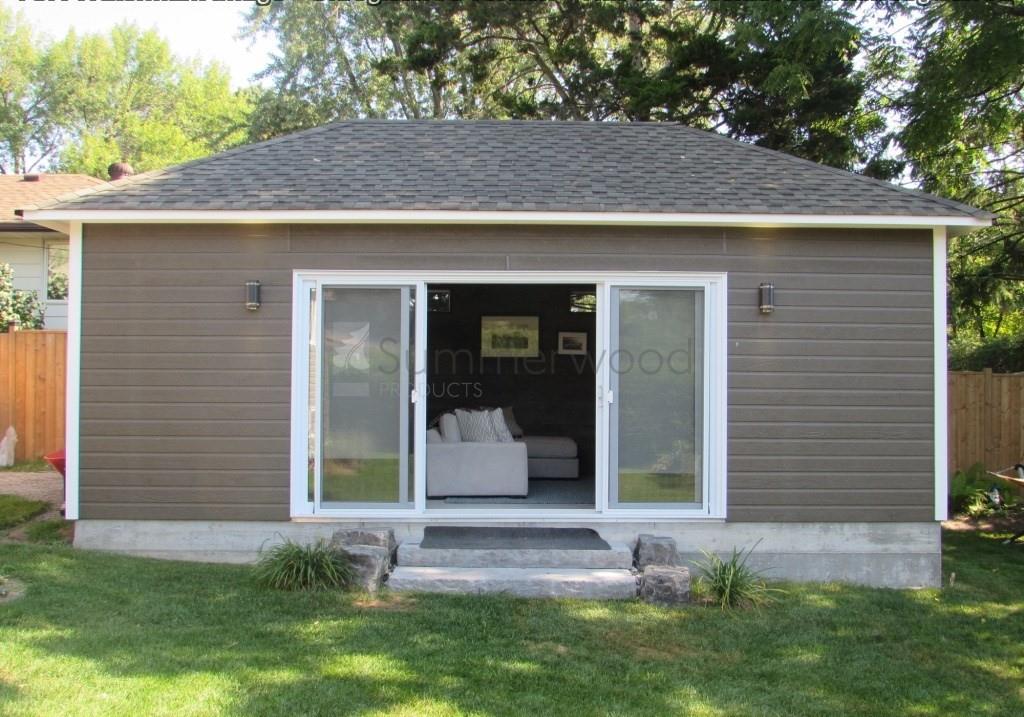 Canexel Walnut Garage Design 13x24 with Garage Door and Single Hung Window in Burlington, Ontario. I