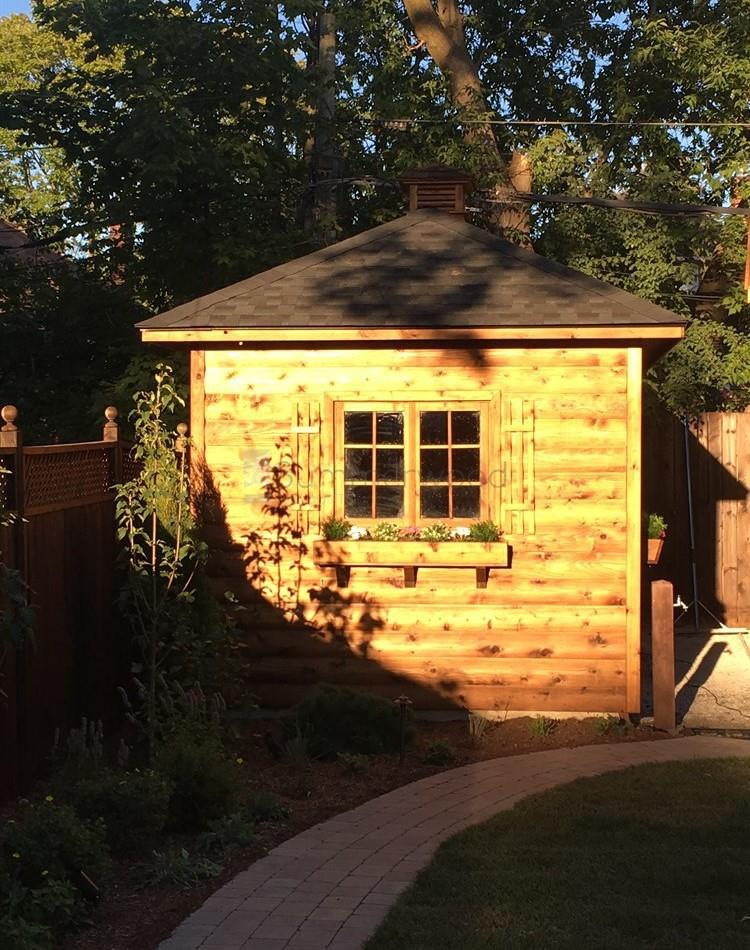 Cedar Sonoma garden shed 9 x16 with log cabin siding in Toronto, Ontario. ID number 206736-4.
