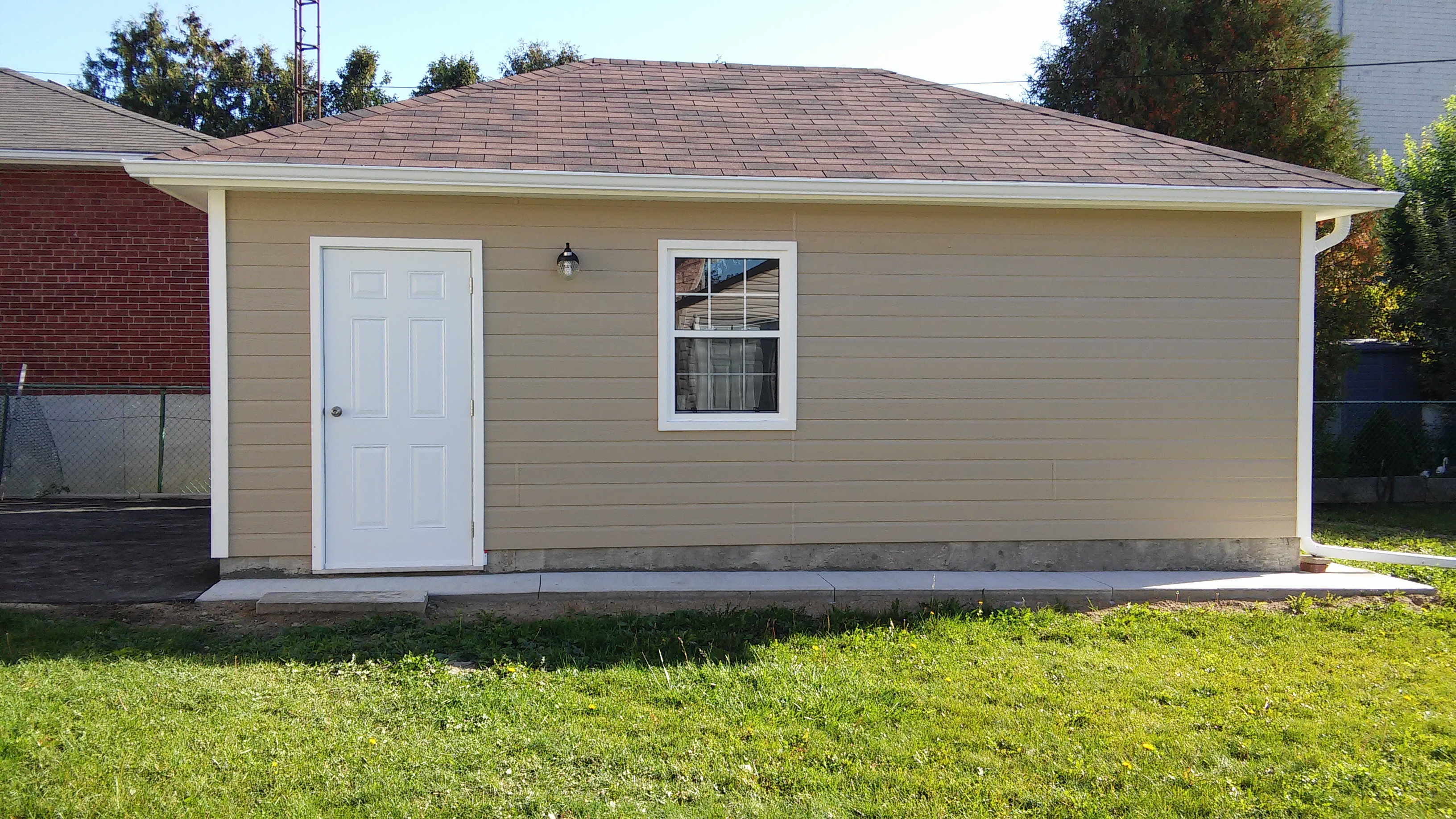 Canexel Archer 16x24 garage with large window in North York, Ontario ID number 222243