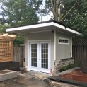 Canexel Mist Grey Verana 8x8 garden shed with metal double doors in North York Ontario. ID number 23