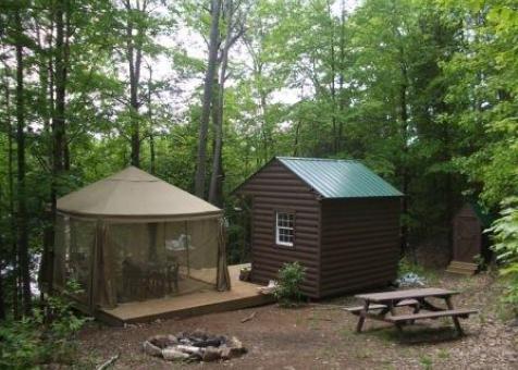 Glen Echo 8x12 cabin kit with barbeque zone in Bannockburn Ontario. ID number 14617-7