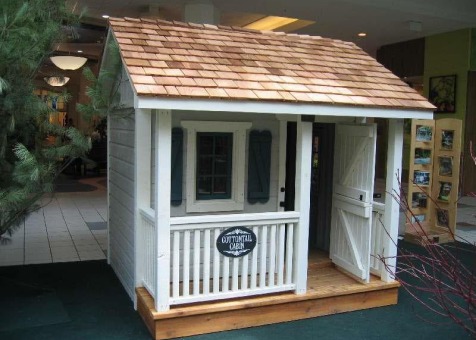 Peach pickers porch 7x7 playhouse with ss1 storm shutters Oshawa Ontario.ID number 5494-1.