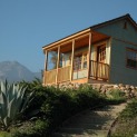 Canmore 14x14 cabins with pane picture window in Santa Barbara California. ID number 1400-2