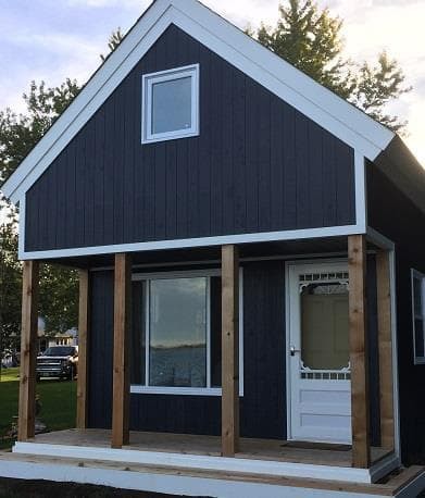 Cheyenne cabin 14x20 with Canexel Midnight Blue siding in Carrying Place Ontario. ID number 194261-1