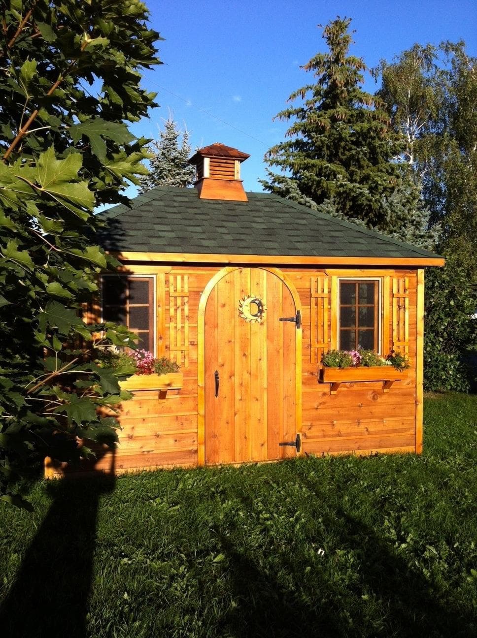Cedar Sonoma 8 X12 cabin with antique flower boxes in Brooklin Ontario. ID number 223823-3