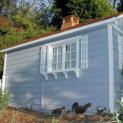 Blue Canexel Palmerston shed 8x14 with cedar shingles in Rolling Green, California. ID number 527-2