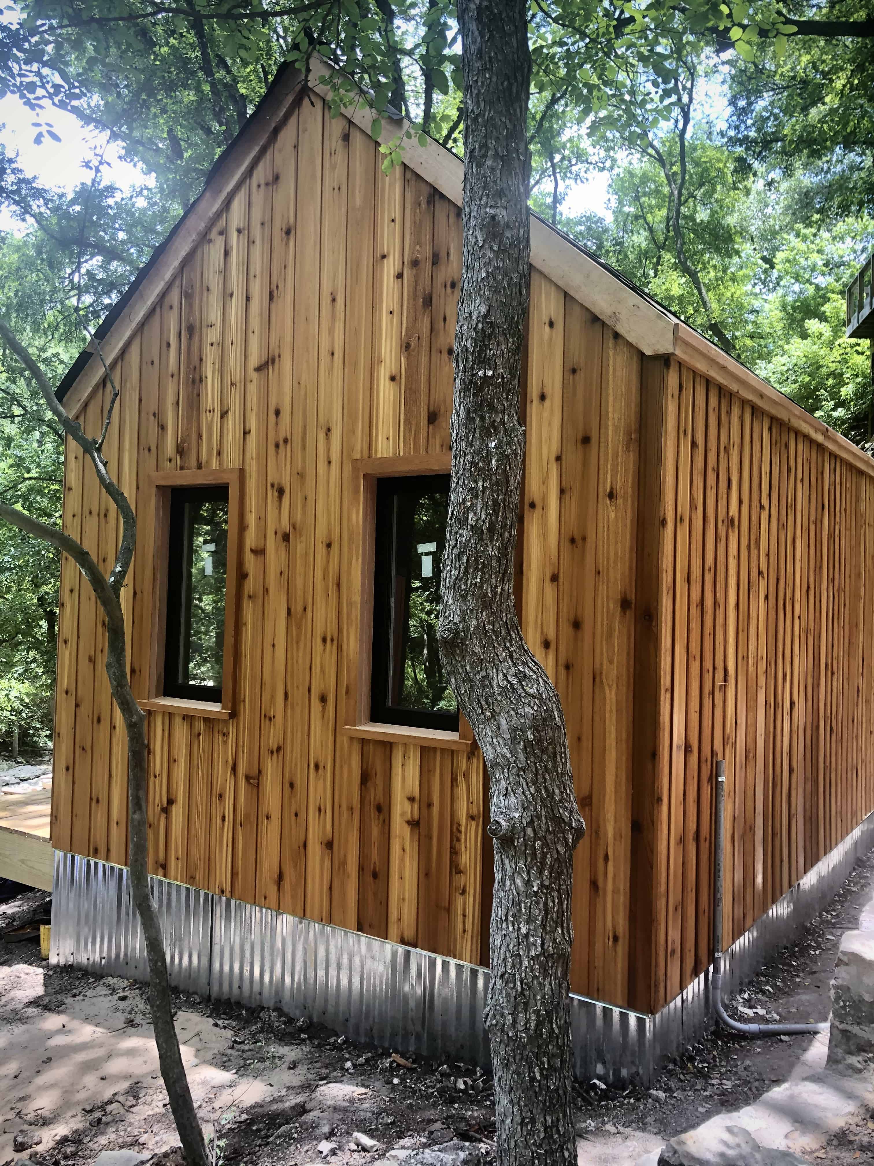 Side view of 12’ x 14' Mini Oban Cabin located in Austin, Texas – Summerwood Products