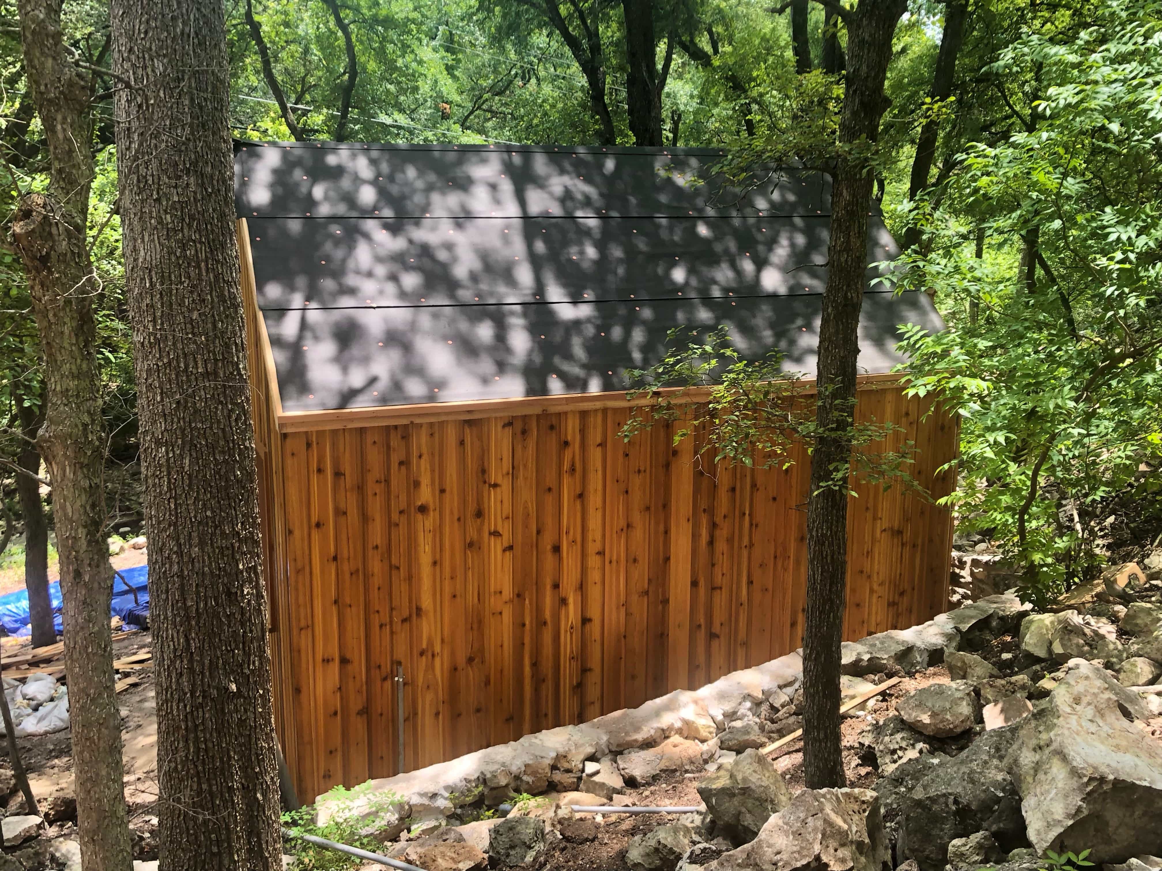 Side view of 12’ x 14' Mini Oban Cabin located in Austin, Texas – Summerwood Products