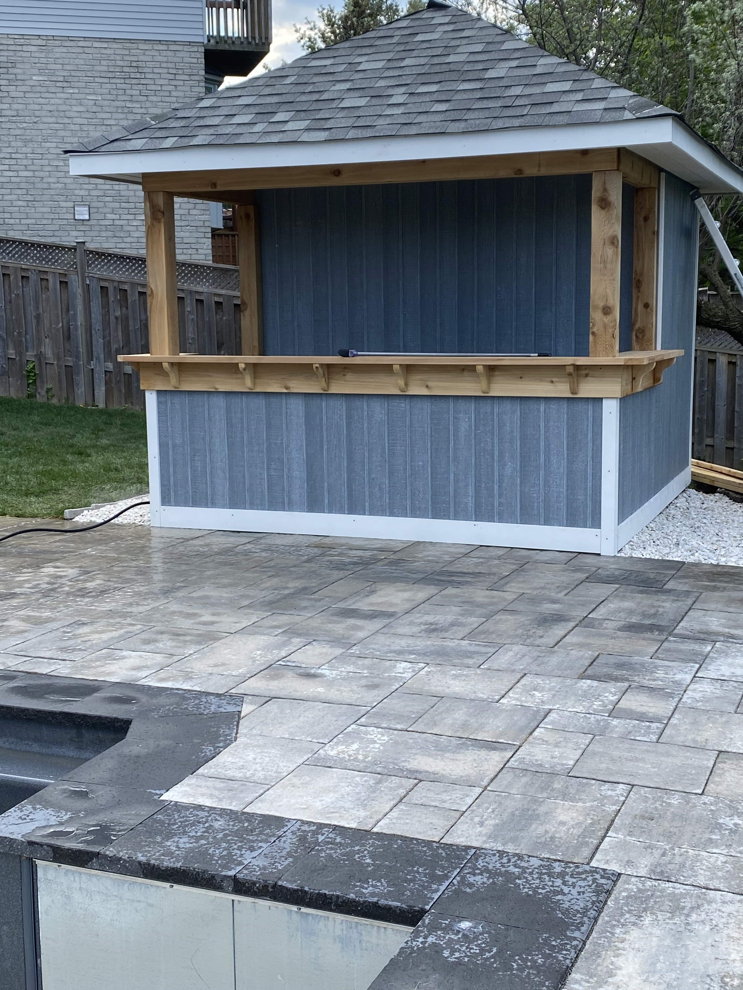 Front view of 10' x 10' Surfside Pool Cabana located in Dundas, Ontario – Summerwood Products