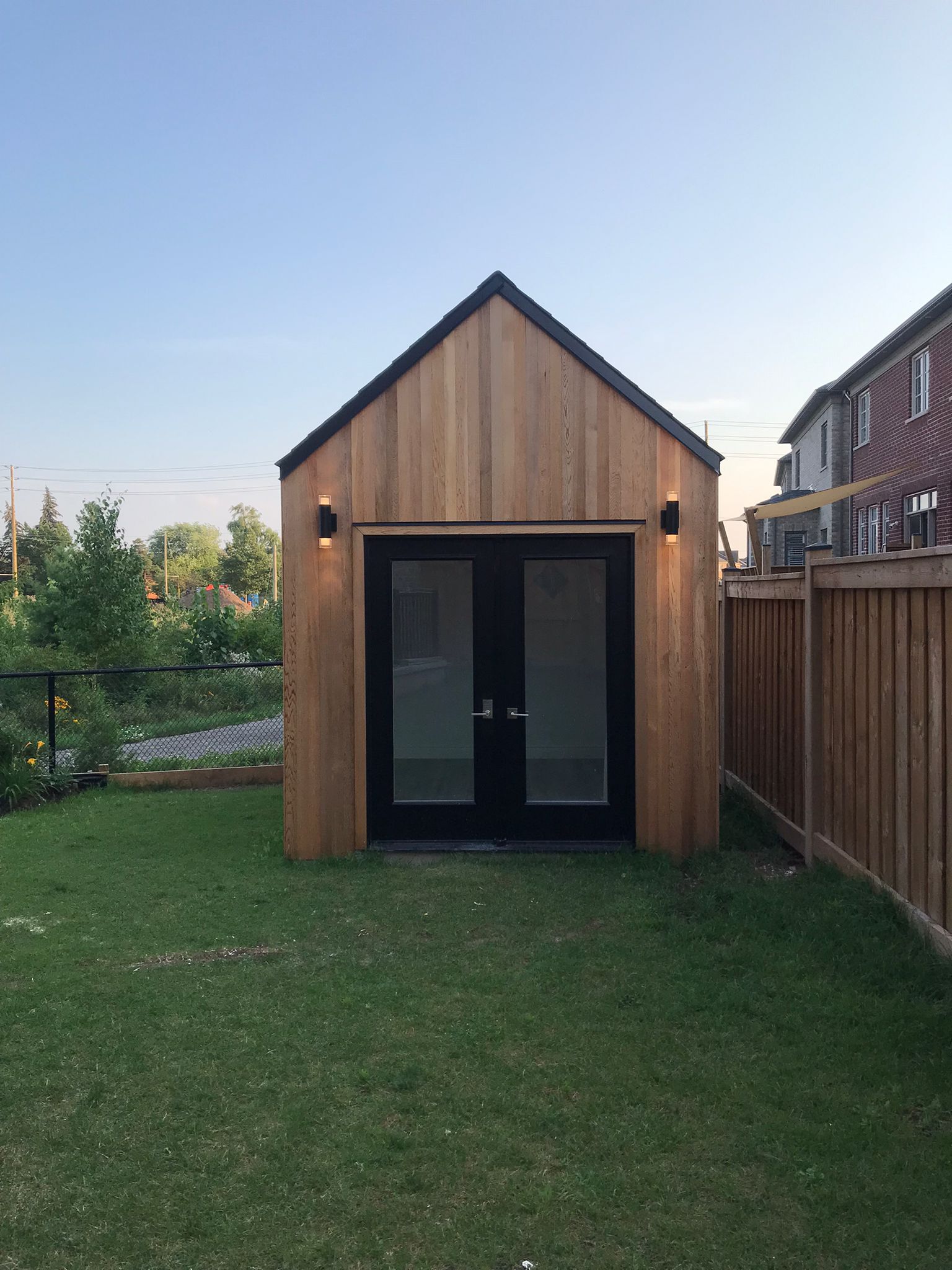Front view of 9' x 12' Mini Oban Home Studio located in Oakville, Ontario – Summerwood Products