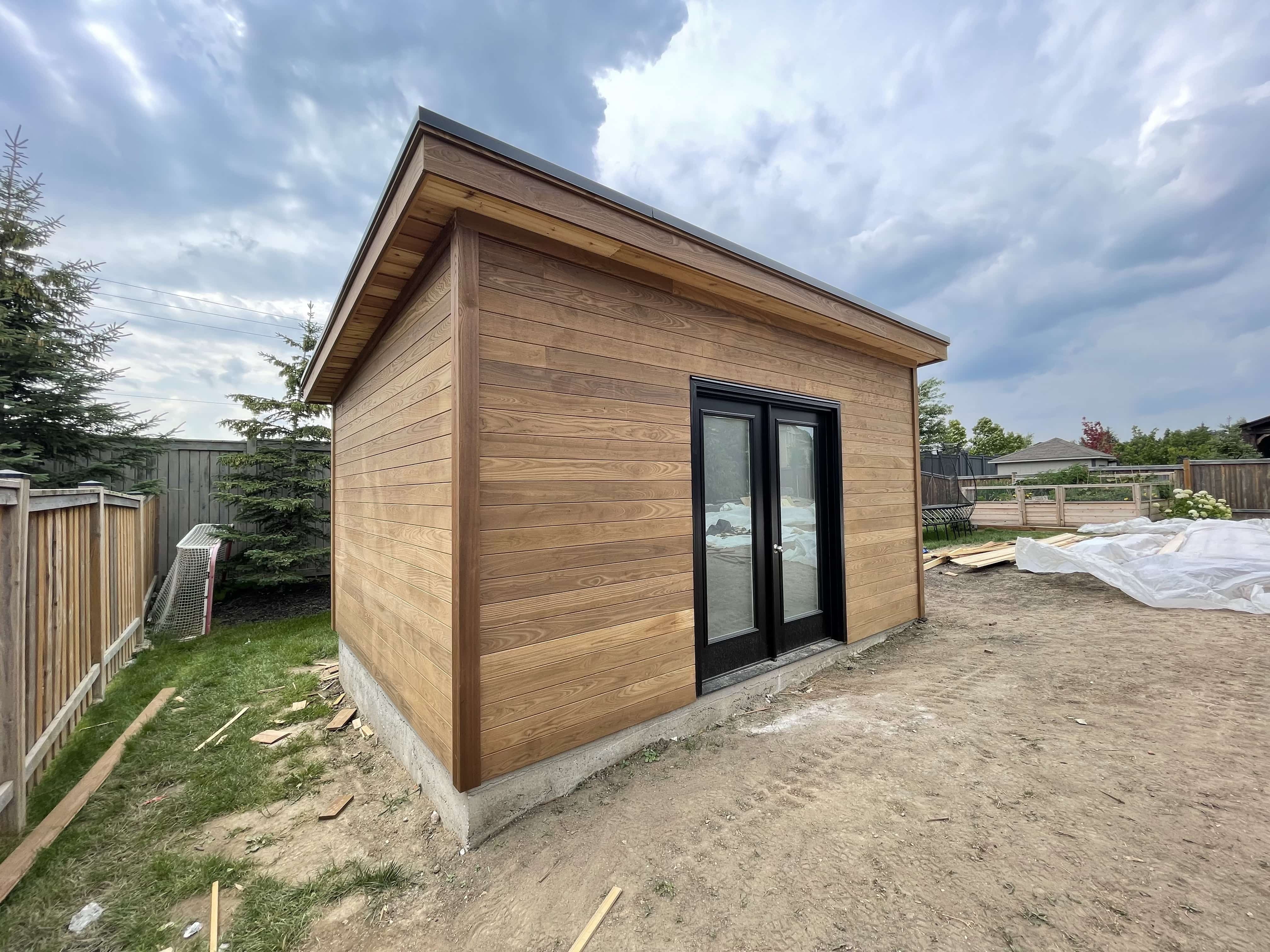 Front view of 16' x 12' Urban Studio Garden Shed located in King City, Ontario – Summerwood Produc