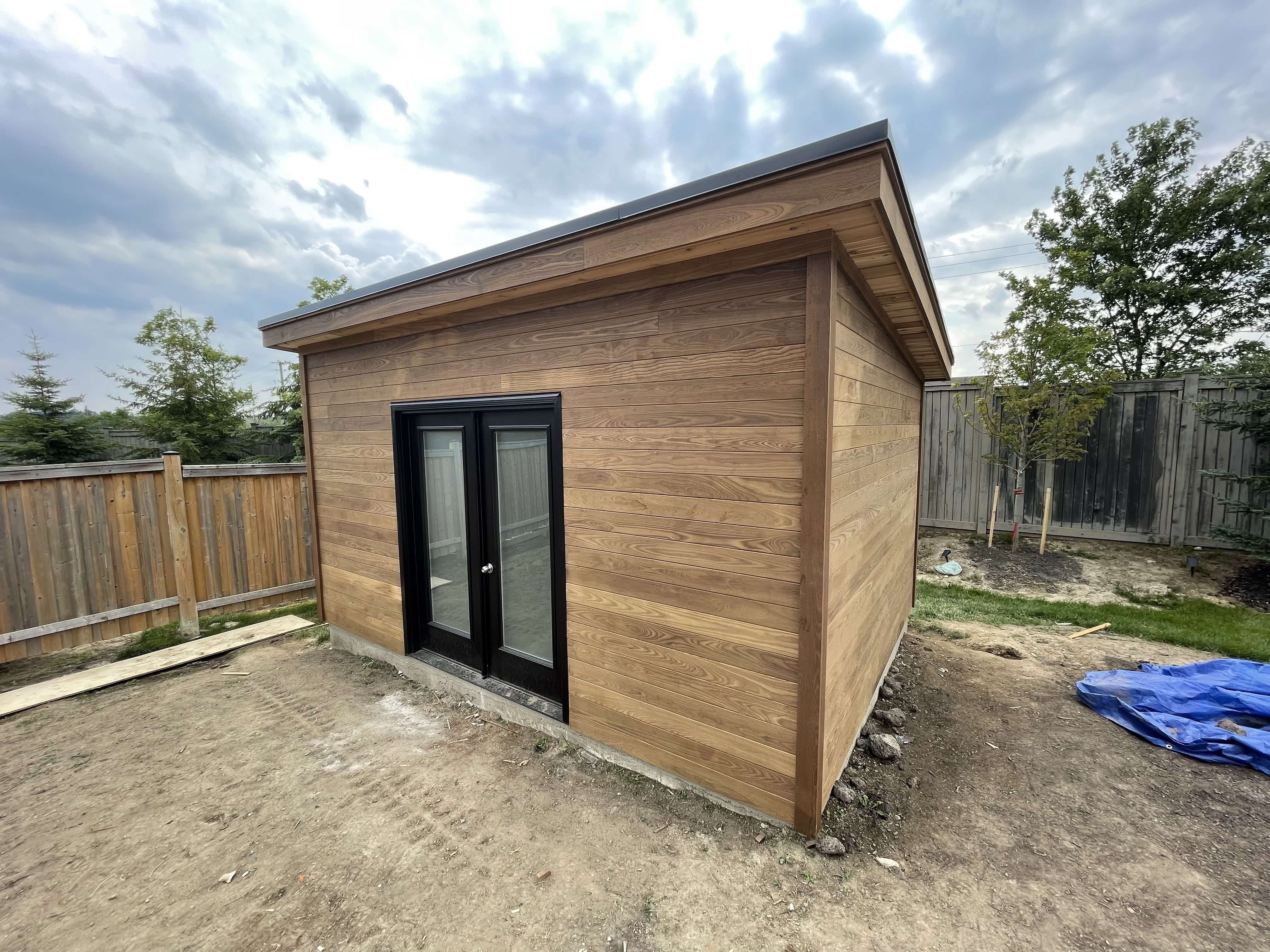 Front view of 16' x 12' Urban Studio Garden Shed located in King City, Ontario – Summerwood Produc