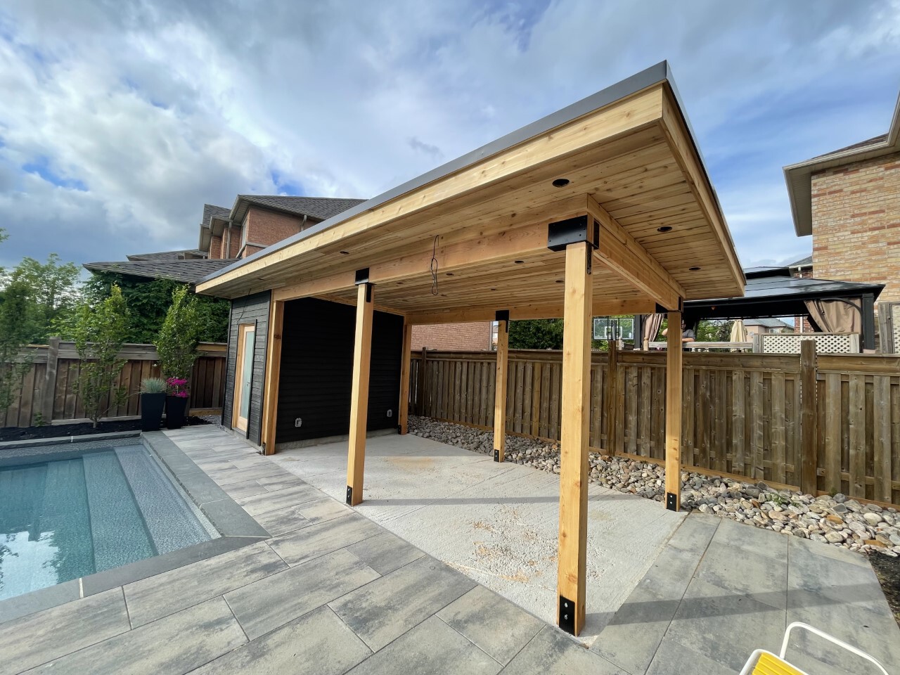 Front view of 10’ x 25' Sanara Pool Cabana located in Aurora, Ontario – Summerwood Products