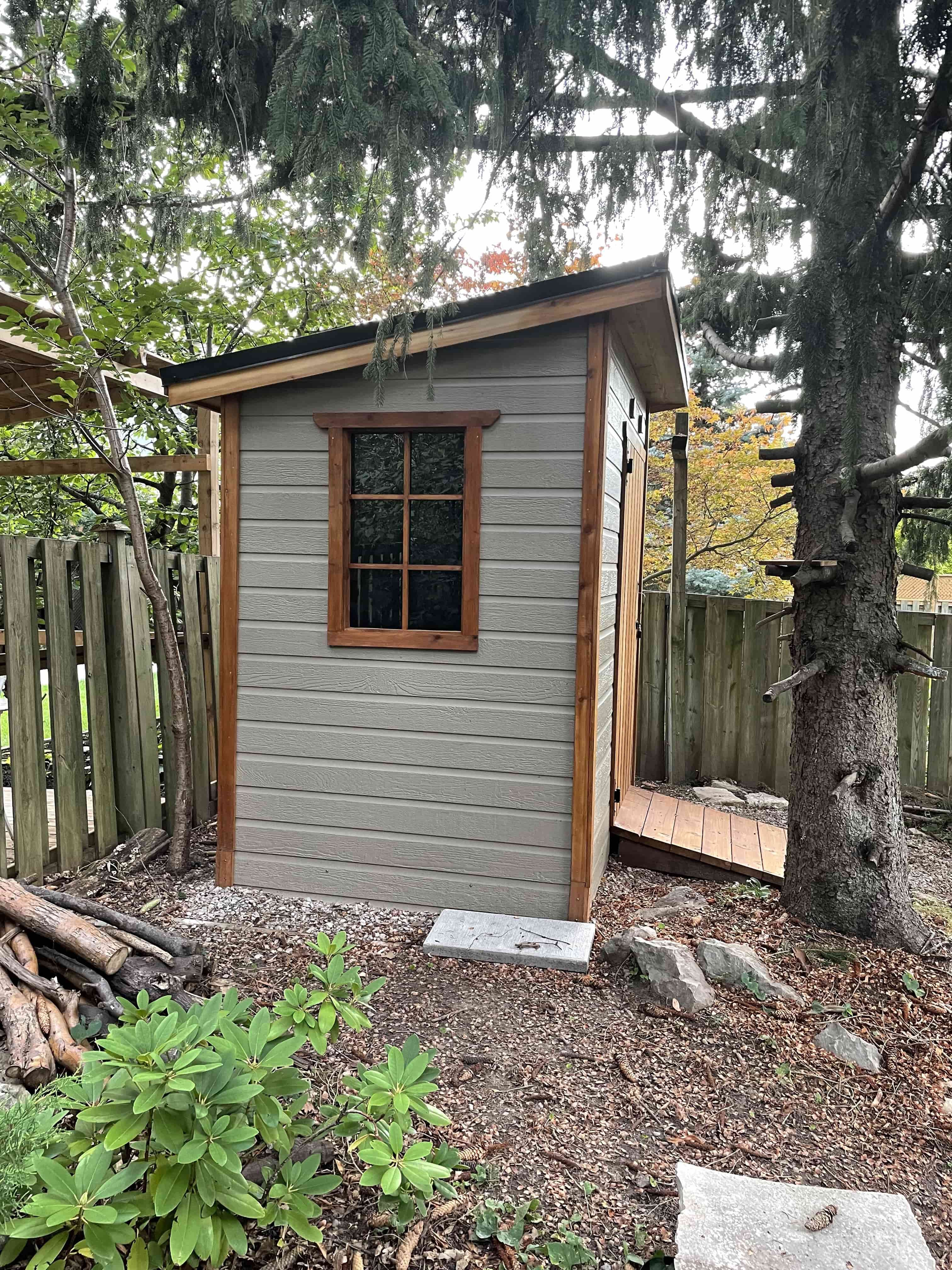 Side view of 5' x 7' Sarawak Garden Shed located in Mississauga, Ontario – Summerwood Products