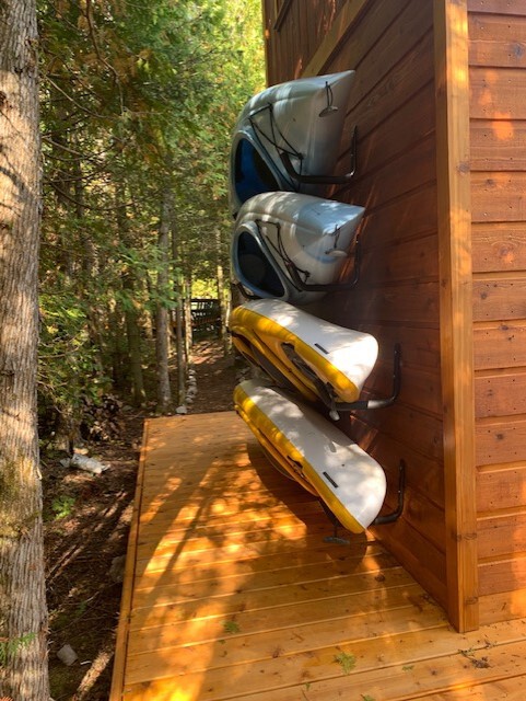 Side view of 10’ x 10' Bala Bunkie Cabin located in Miller Lake, Ontario – Summerwood Products
