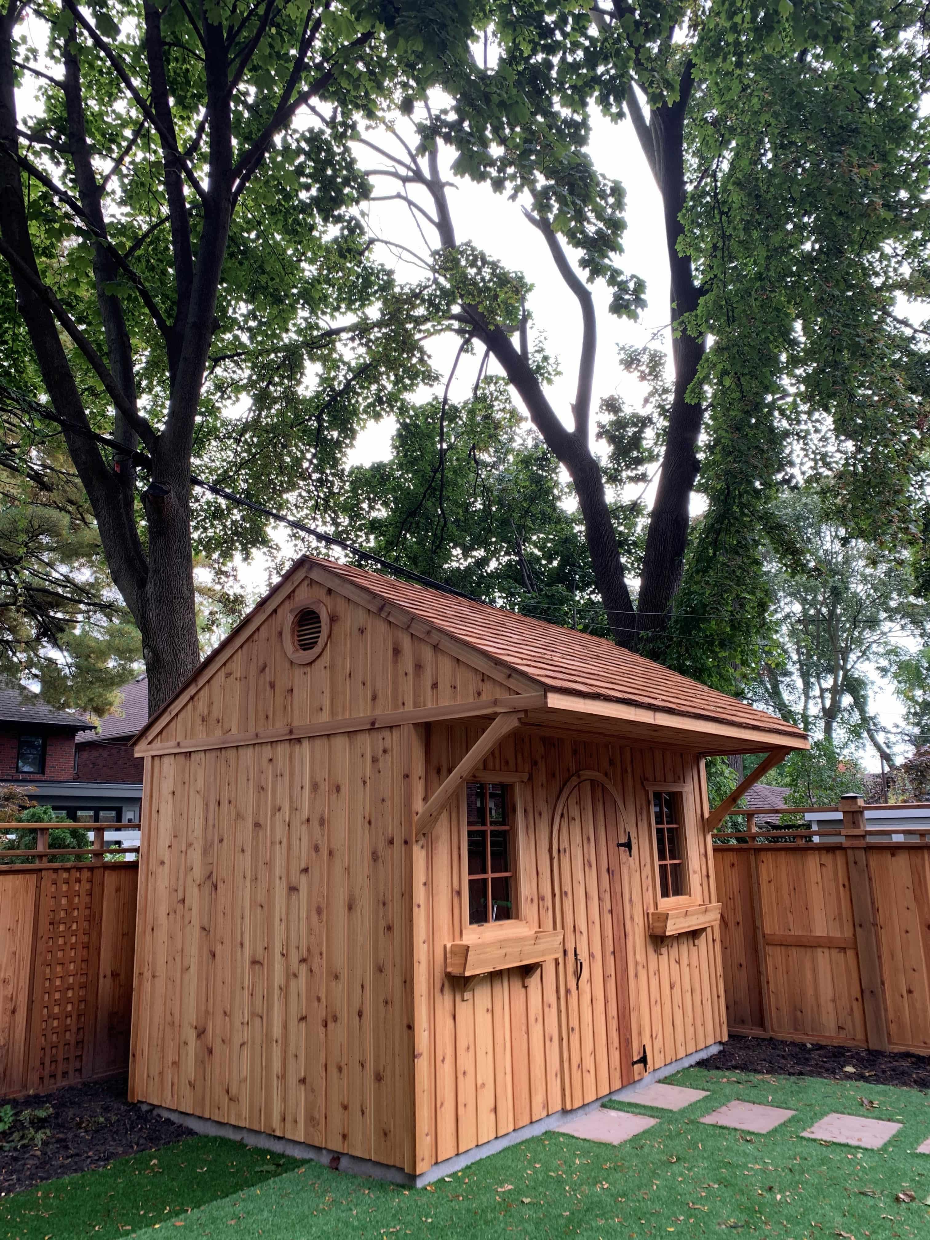 Side view of 8’ x 12' Glen Echo Garden Shed located in Etobicoke, Ontario – Summerwood Products