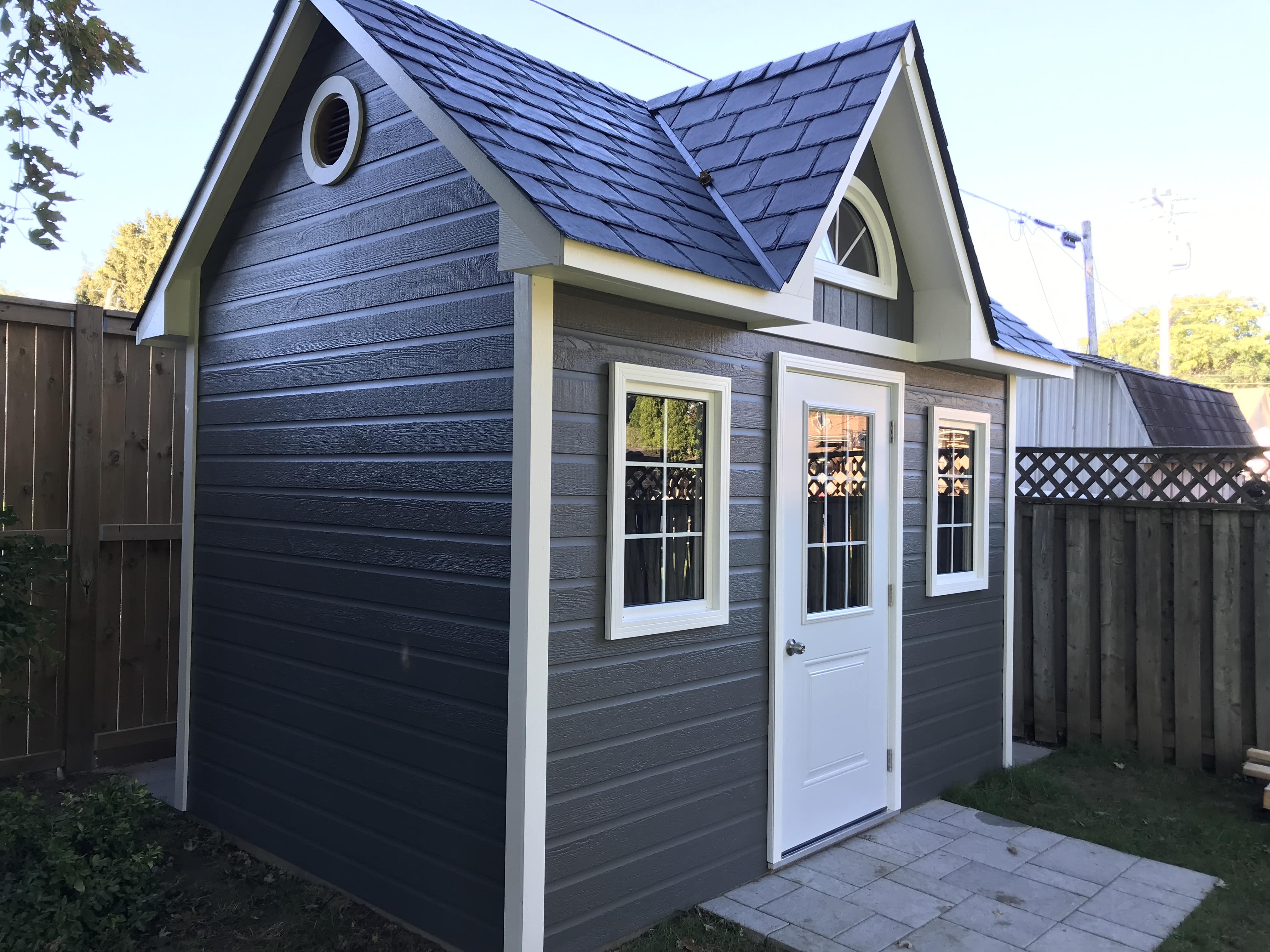 Side view of 8’ x 12' Copper Creek Garden Shed located in Grimsby, Ontario – Summerwood Products