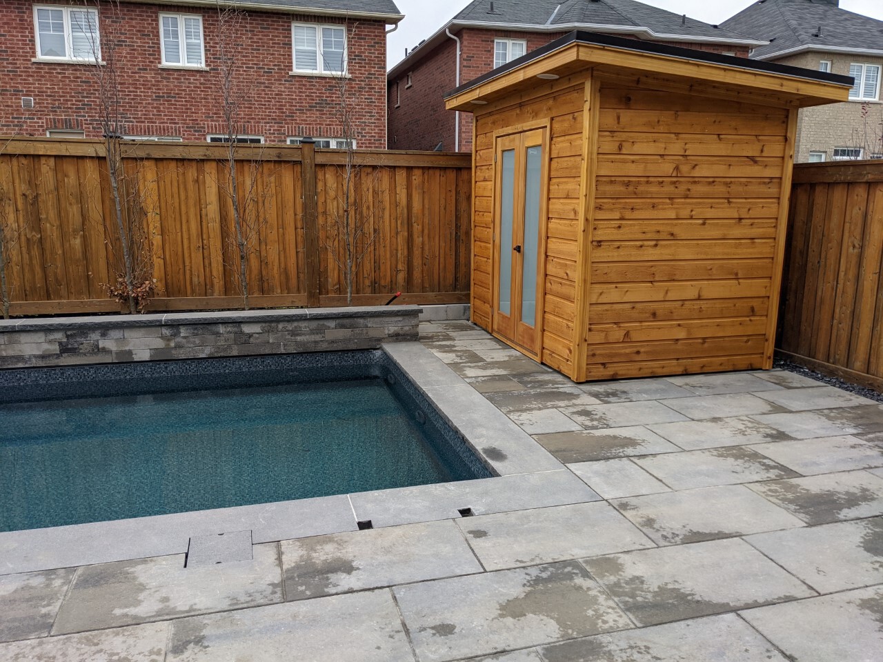 Side view of 6' x 9' Urban Studio Pool Cabana located in Ajax, Ontario – Summerwood Products
