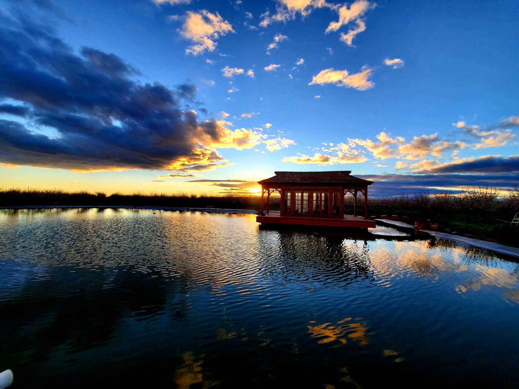 Side view of 10' x 25' Bali Tea House Gazebo located in Palo Alto, California - Summerwood Products