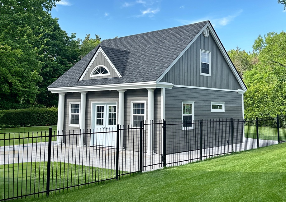 Backyard Man Cave - Outside View of a Black Siding Modern Garage With One Door - Prefab kit