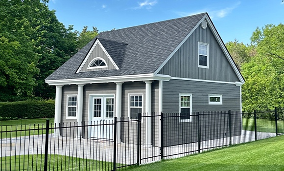 Backyard Man Cave - Outside View of a Black Siding Modern Garage With One Door - Prefab kit