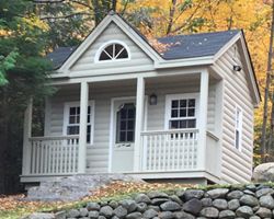 Cedar Log Cabin Siding Material on a prefab kit Canmore design